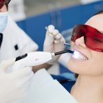 Orthodontist performing soft tissue laser treatment in Culver City